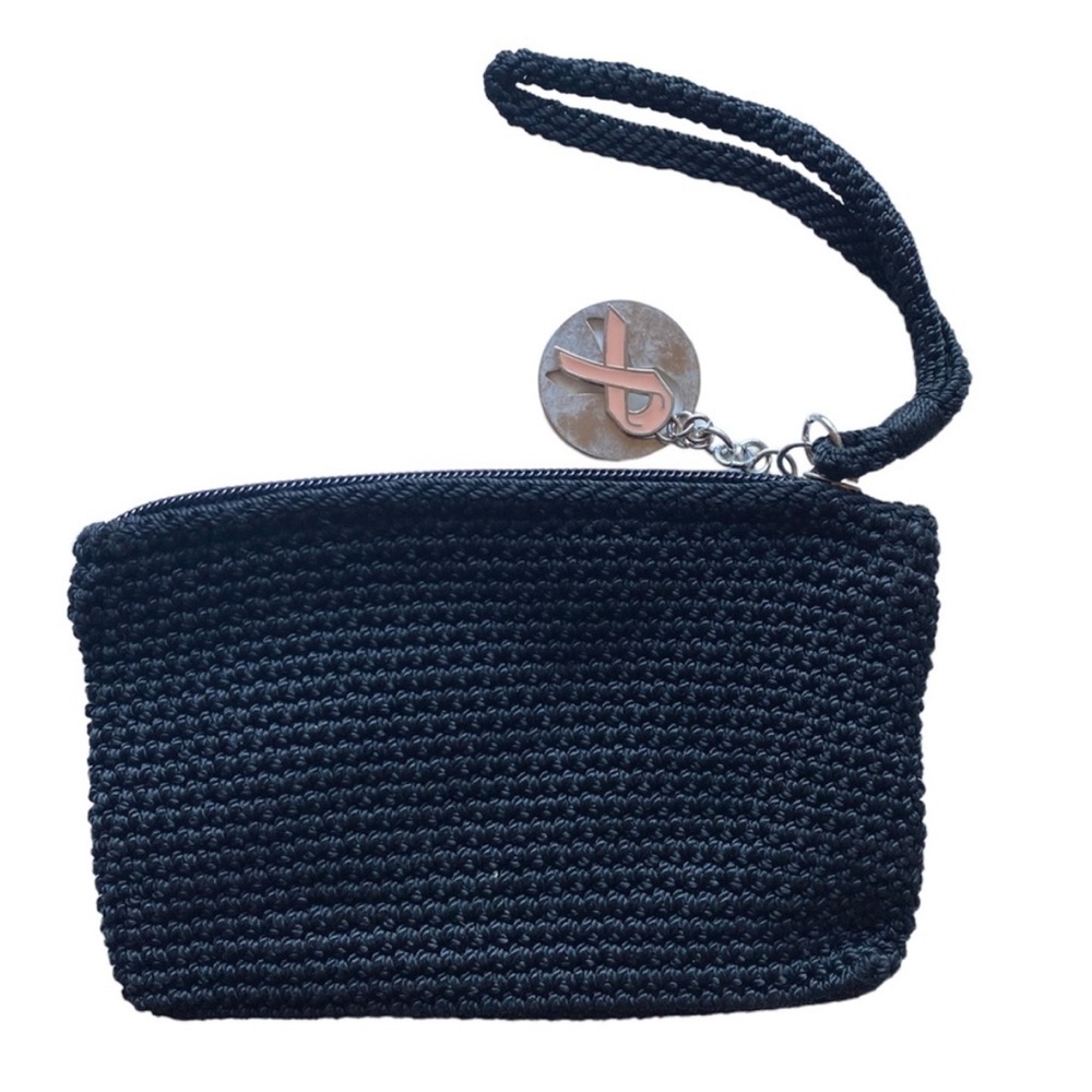 The SAK Breast Cancer Ribbon Charm wristlet bag